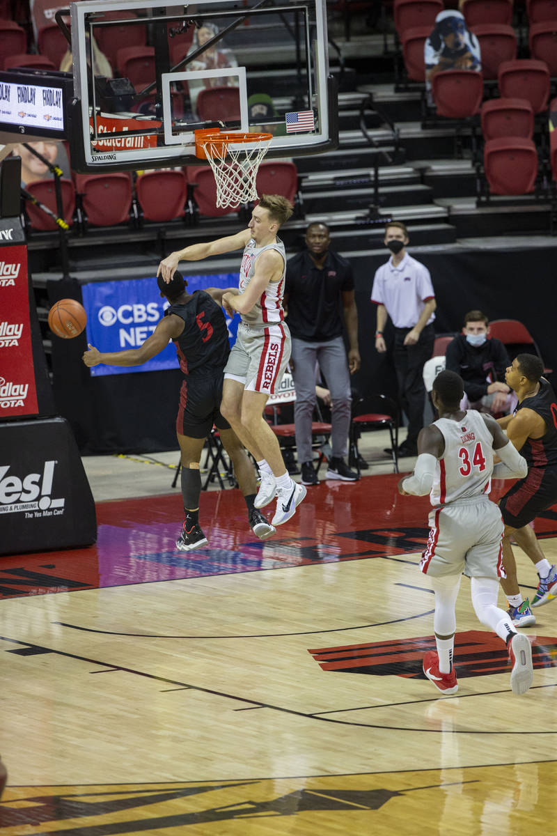 UNLV Rebels forward Moses Wood (1) blocks a shot by San Diego State Aztecs guard Lamont Butler ...