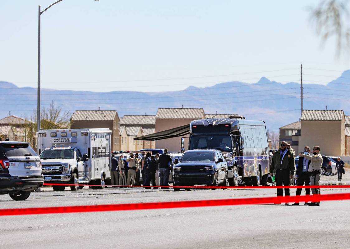 Police investigate the scene of an officer-involved shooting Monday, March 1, 2021 in northeast ...