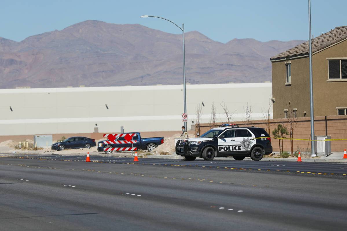 Police investigate the scene of an officer-involved shooting Monday, March 1, 2021 in northeast ...