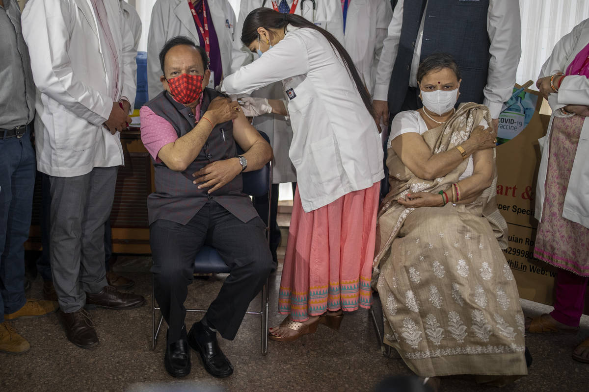 Indian Health Minister Harsh Vardhan is administered the COVAXIN vaccine, developed by Indian c ...