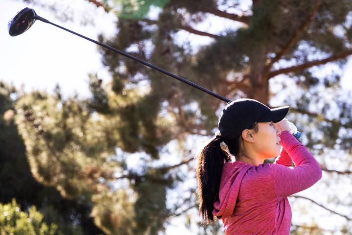 Las Vegas resident Danielle Kang, ranked in the top 5 on the LPGA Tour, plays the 18th hole at ...