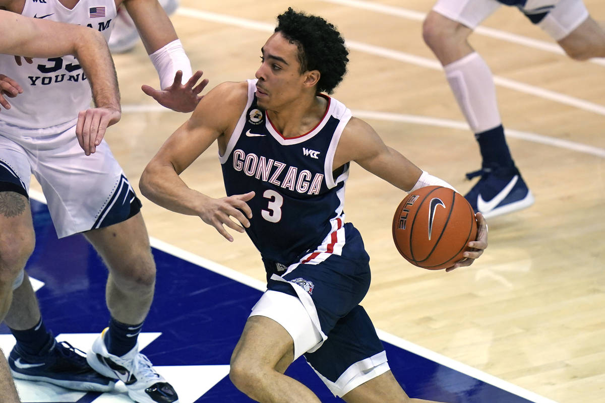 Gonzaga guard Andrew Nembhard (3) drives to the basket in the second half during an NCAA colleg ...