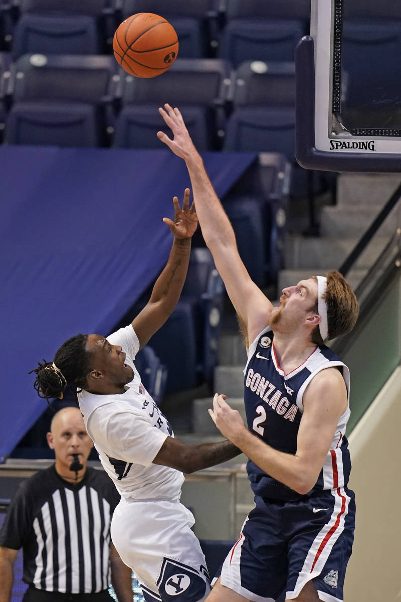 Gonzaga forward Drew Timme (2) defends against BYU guard Brandon Averette, left, in the second ...