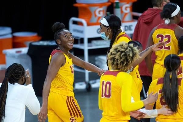 USC Trojans forward Jordan Sanders (5) looks at the playback of herself scoring a point against ...
