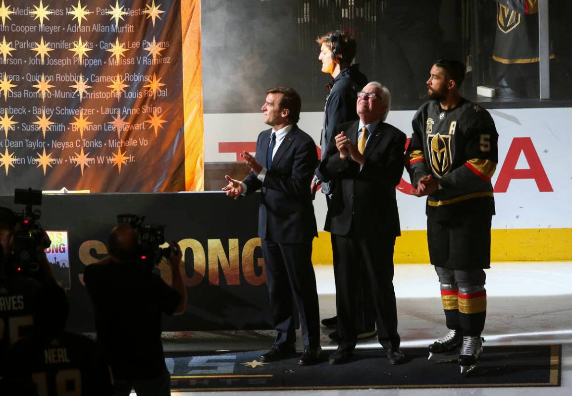 Golden Knights general manager George McPhee, from left, team owner Bill Foley and defenseman D ...