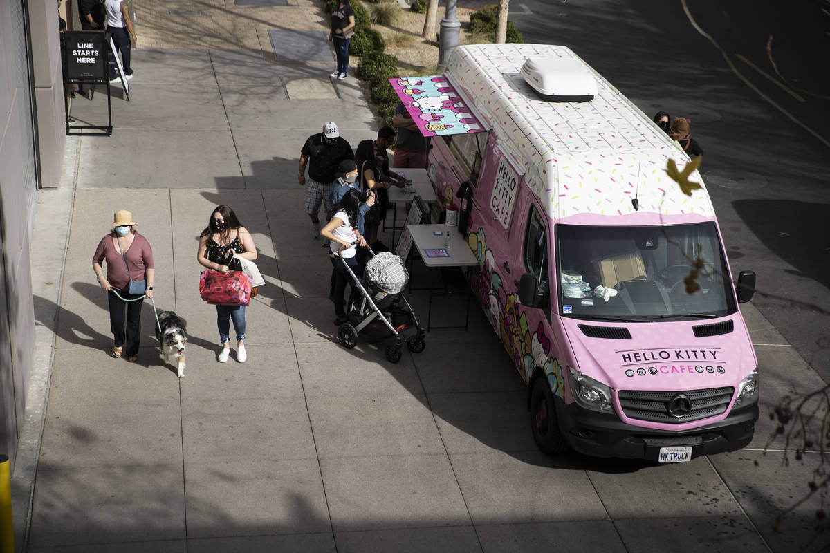 People visit the Hello Kitty Cafe truck at Downtown Summerlin in Las Vegas, on Saturday, March ...