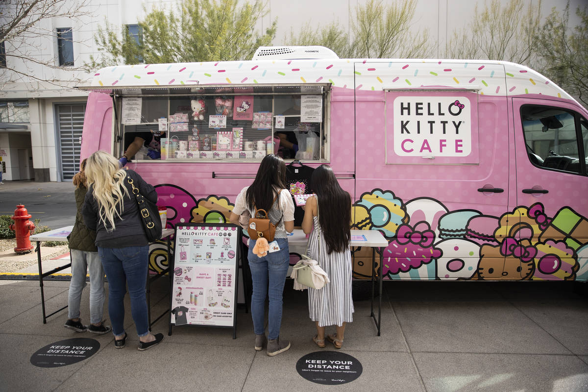 People visit the Hello Kitty Cafe truck at Downtown Summerlin in Las Vegas, on Saturday, March ...