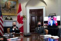 President Joe Biden and Secretary of State Antony Blinken listen as Canadian Prime Minister Jus ...