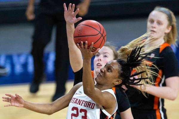 Stanford Cardinal guard Kiana Williams (23) attempts a point as Oregon State Beavers guard Jasm ...