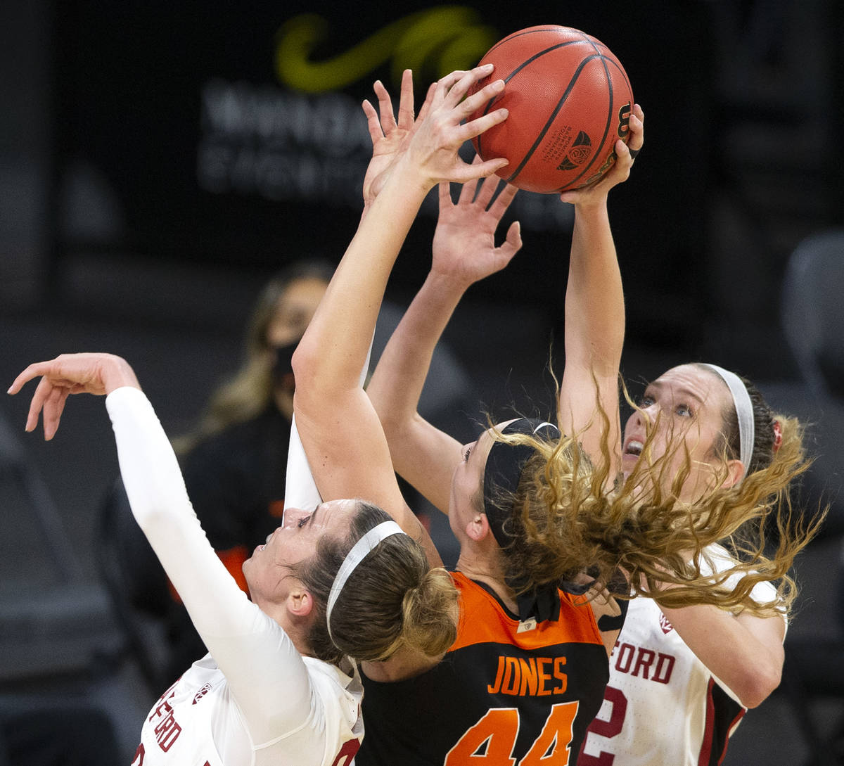 Stanford Cardinal guard Lacie Hull (24), left, and guard Lexie Hull (12), right, block an attem ...