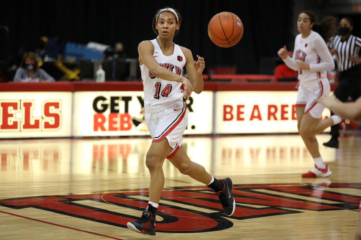 UNLV Lady Rebels guard Bailey Thomas makes a pass against Colorado State University at Cox Pavi ...