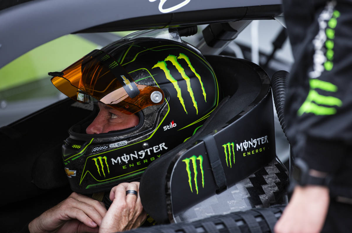 Kurt Busch puts on his helmet before the start of a NASCAR Cup Series Pennzoil 400 auto race at ...