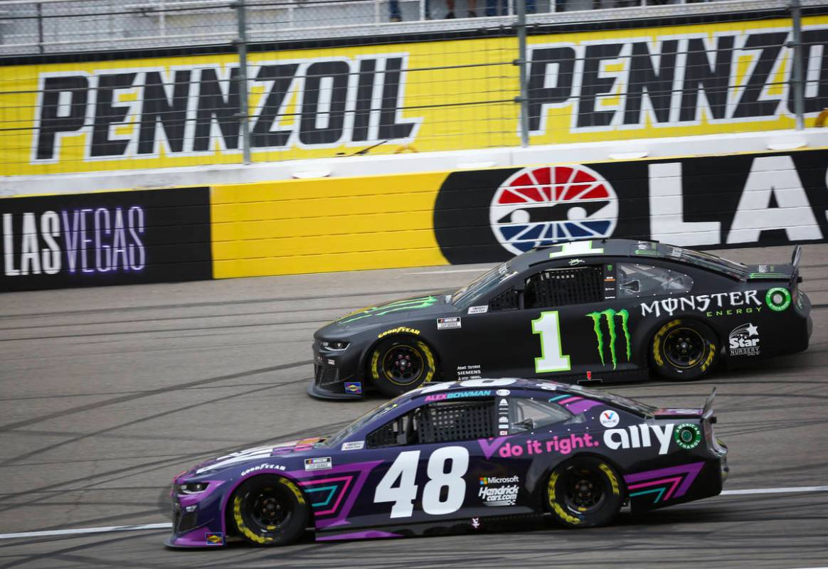 Kurt Busch (1) and Alex Bowman (48) drive during a NASCAR Cup Series Pennzoil 400 auto race at ...