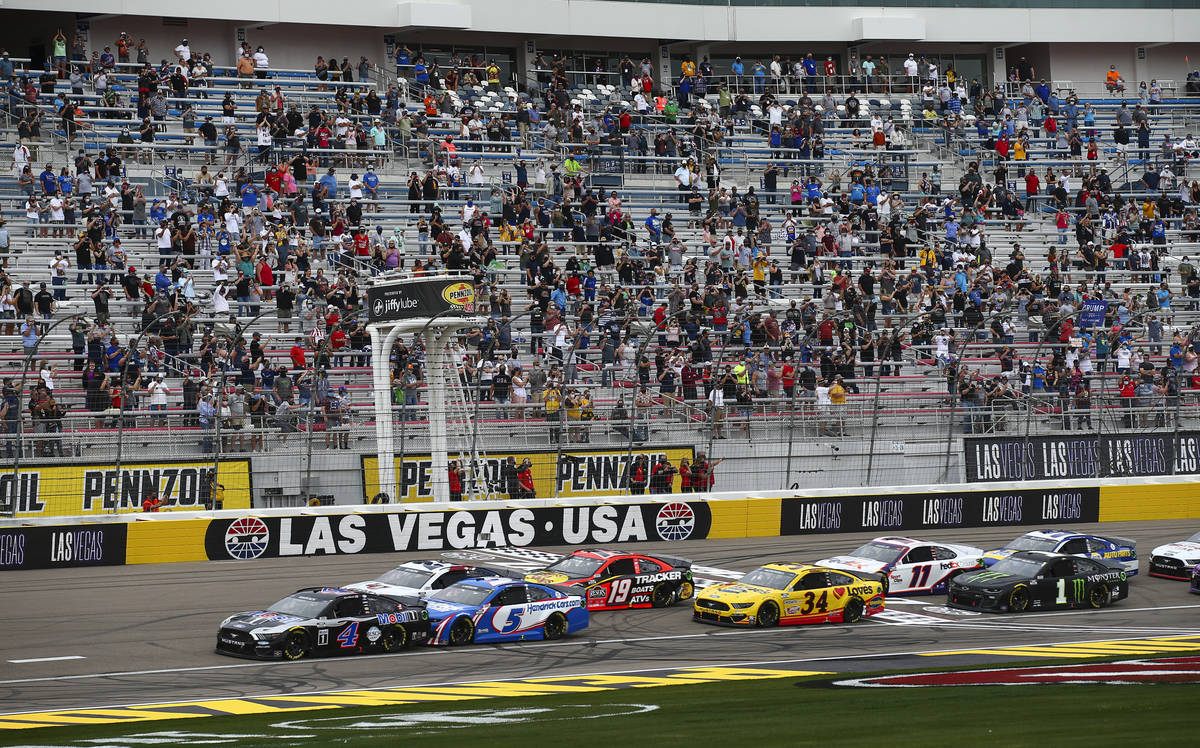 Drivers take the green flag to start the NASCAR Cup Series Pennzoil 400 auto race at the Las Ve ...