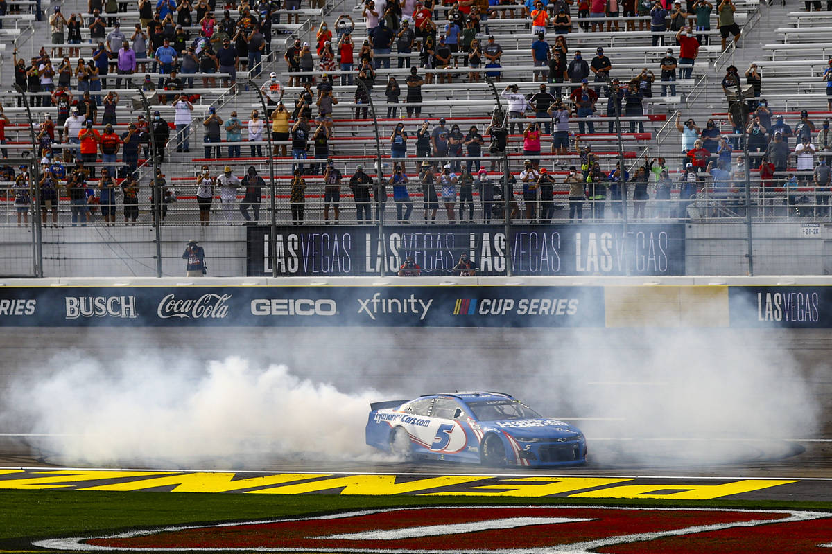 Kyle Larson does a burnout after winning the NASCAR Cup Series Pennzoil 400 auto race at the La ...