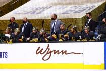 Golden Knights head coach Pete DeBoer looks on from the bench during the first period of an NHL ...