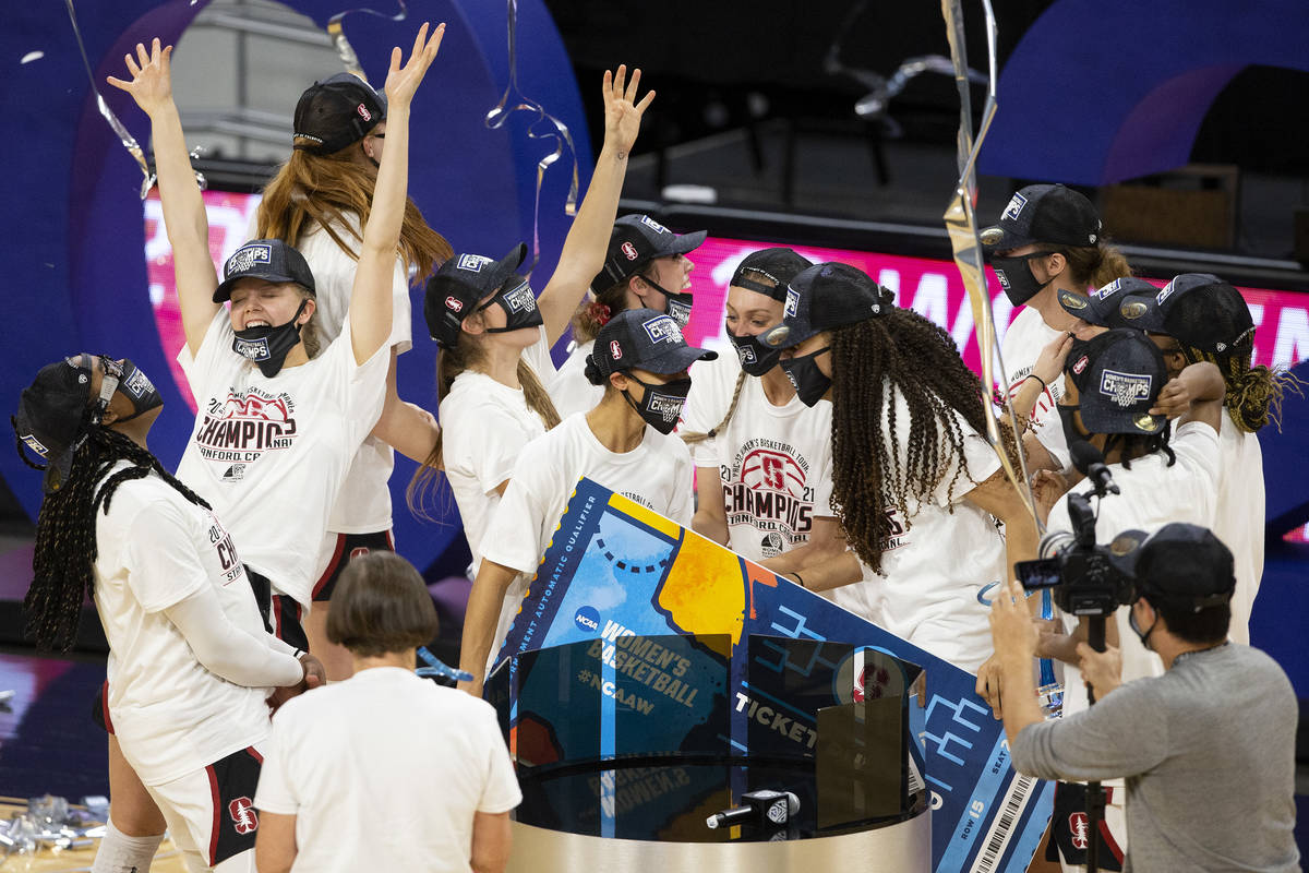 The Stanford Cardinal celebrate after winning the championship NCAA college basketball game at ...