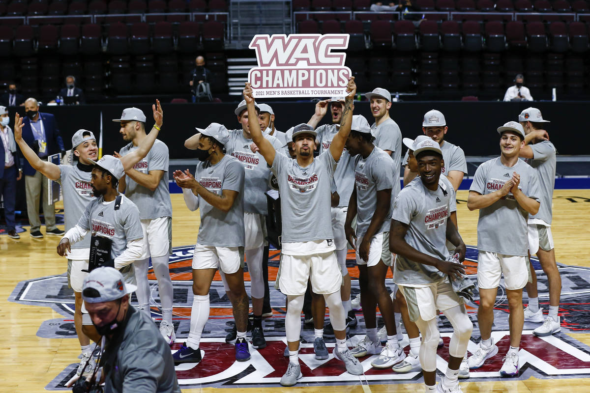 Grand Canyon players celebrate after defeating New Mexico State 74-56 in an NCAA college basket ...