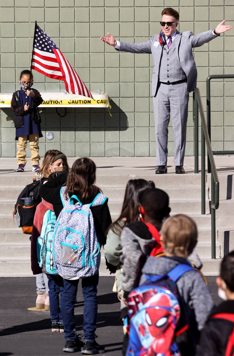 Principal Jaymes Aimetti welcomes student the first day of face-to-face hybrid instruction at B ...