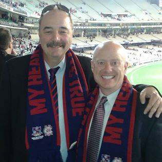 Big West Commissioner Dan Butterly stands with Australian broadcaster Mark Seymour at an Austra ...