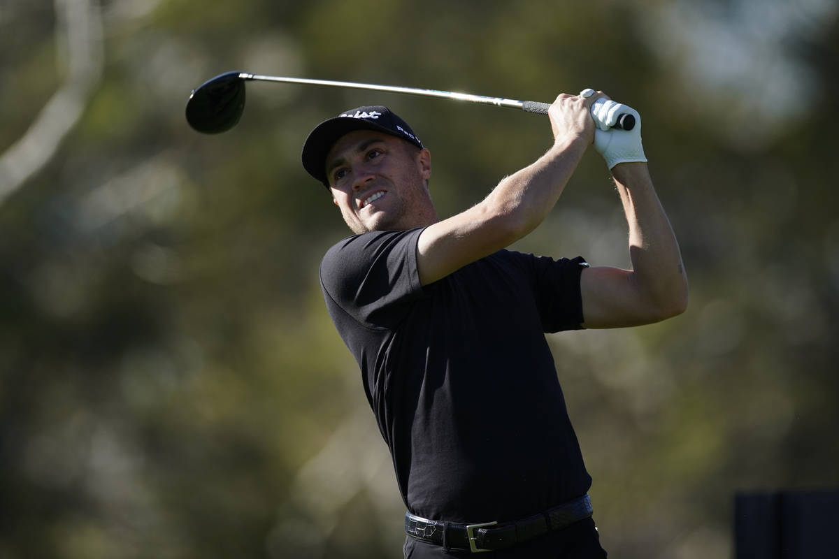 Justin Thomas tees off on the 17th hole during the second round of the Genesis Invitational gol ...