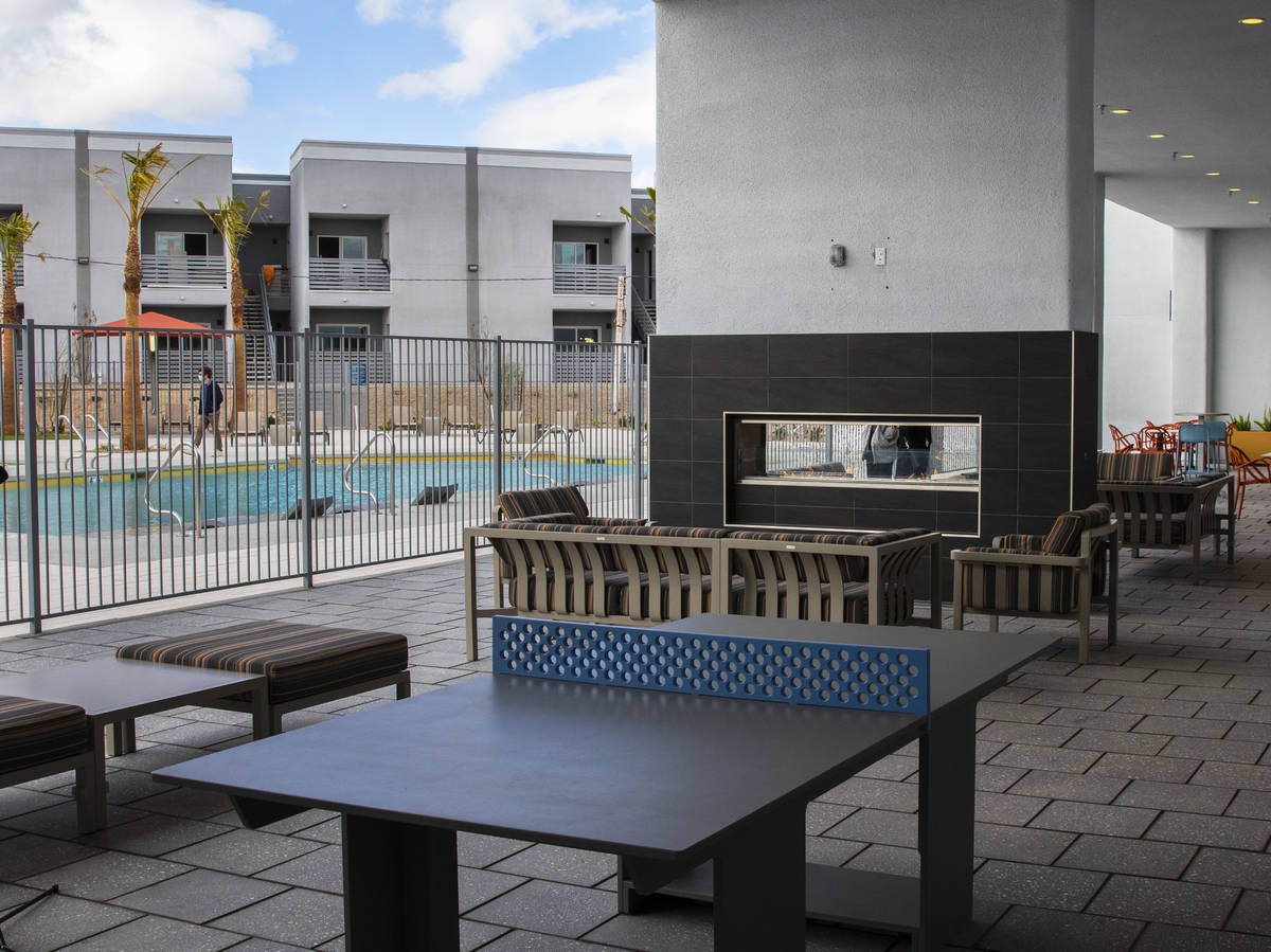 Outdoor fireplace and play area at the newly opened Showboat Park apartment complex, on Wednesd ...