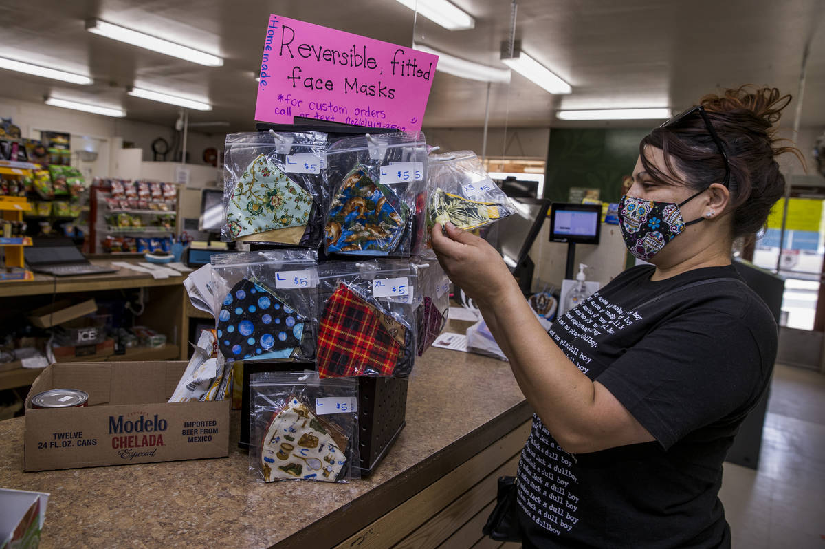 Tracy Hall with her handmade masks for sale within the Esmeralda Market operated for 42 years w ...