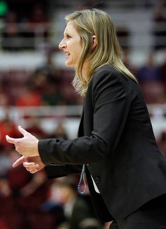 UC Davis head coach Jennifer Gross talks to her team from the sideline during the first half of ...