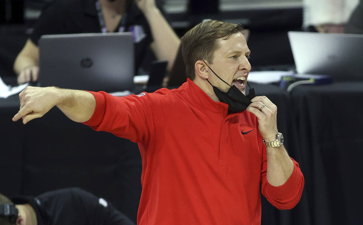 UNLV coach T.J. Otzelberger gestures during the second half of the team's NCAA college basketba ...