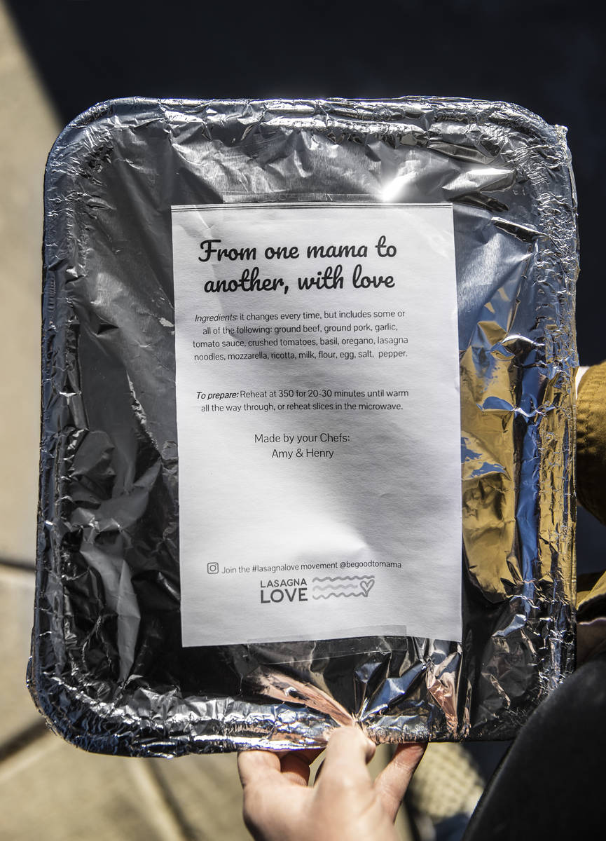 Amy Kelly delivers lasagne to a home in Las Vegas. Lasagne Love is a national program that prov ...