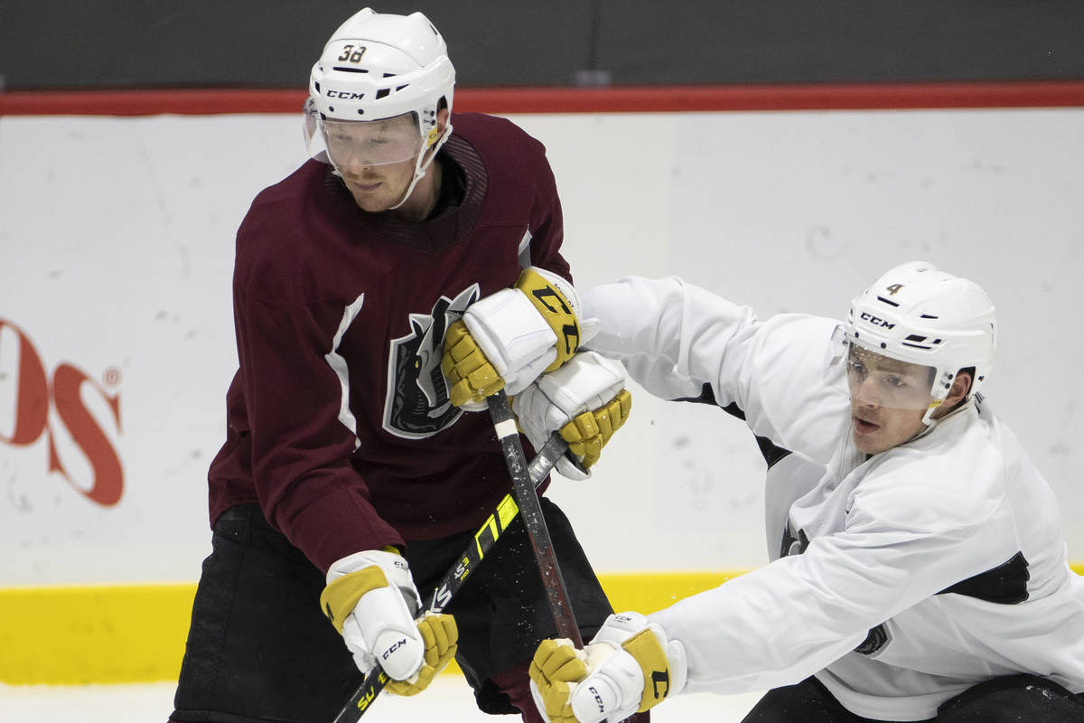 The Henderson Silver Knights' Patrick Brown (38) and Jimmy Schuldt (4) during a team practice a ...