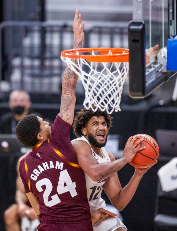 Arizona State Sun Devils forward Jalen Graham (24) is unable to protect the net from Oregon Duc ...