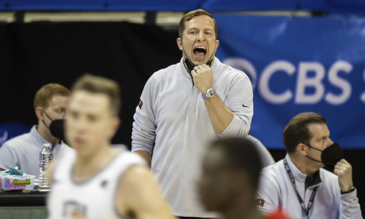 UNLV Rebels head coach T.J. Otzelberger calls a play in the first half during the Mountain West ...