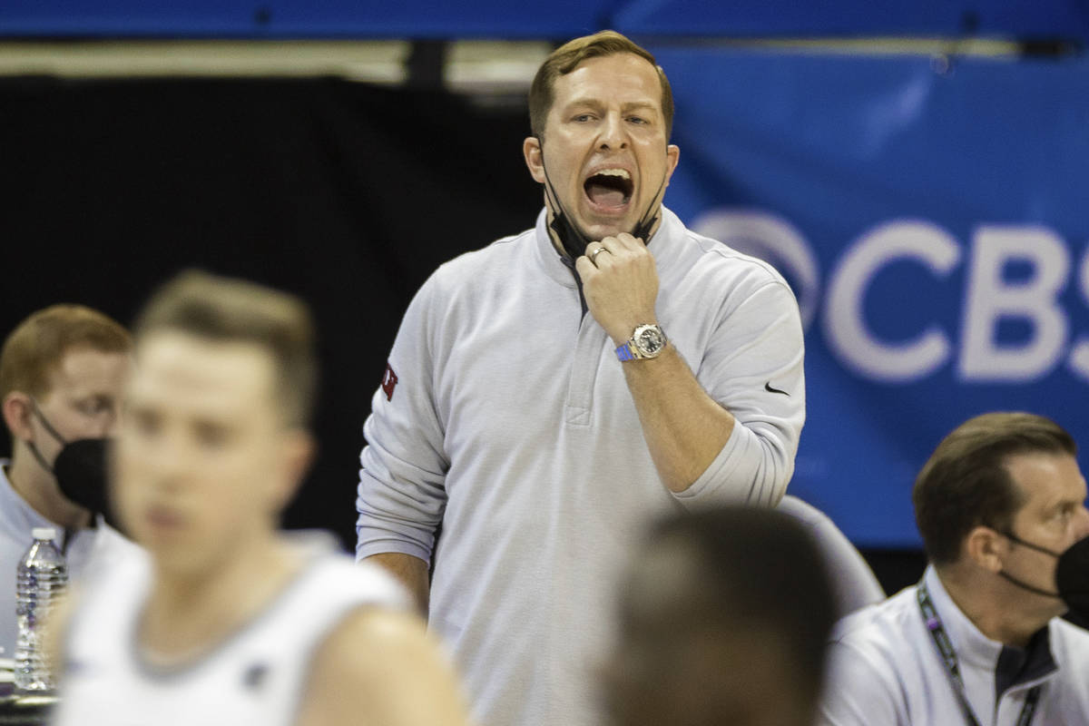 UNLV Rebels head coach T.J. Otzelberger calls a play in the first half during the Mountain West ...