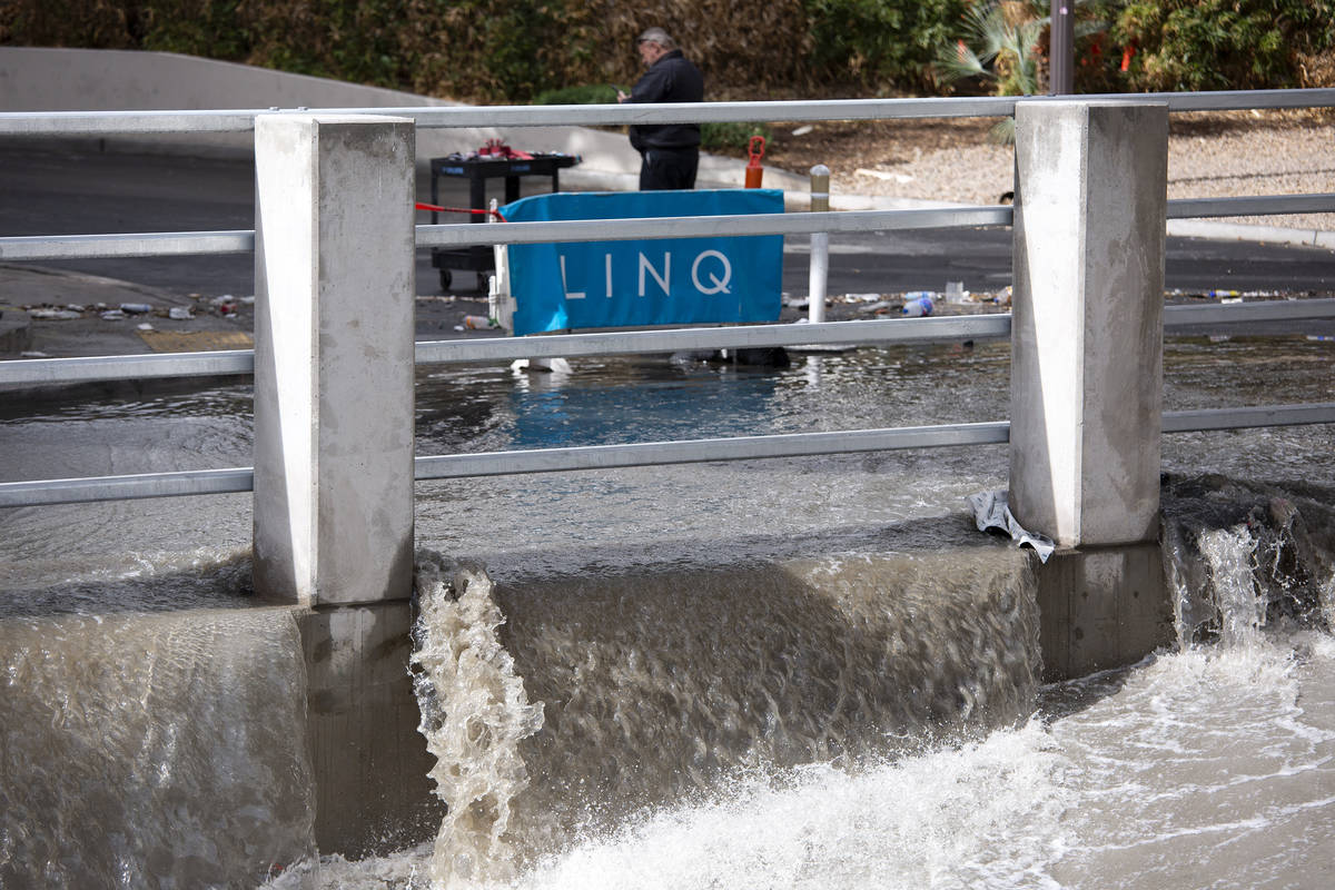 A flash flood at The LINQ parking garage rushes into a wash on Friday, March 12, 2021, in Las V ...