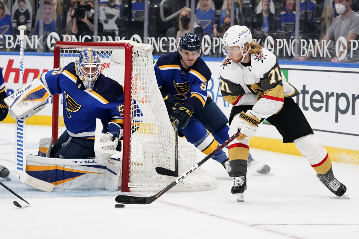 Vegas Golden Knights' William Karlsson (71) tries to get off a shot as St. Louis Blues' goalten ...