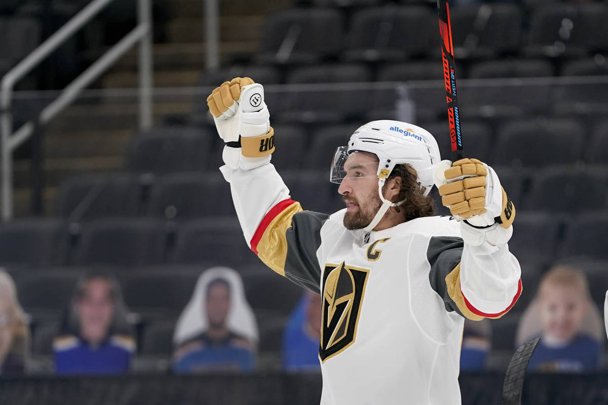 Vegas Golden Knights' Mark Stone celebrates after scoring during the third period of an NHL hoc ...