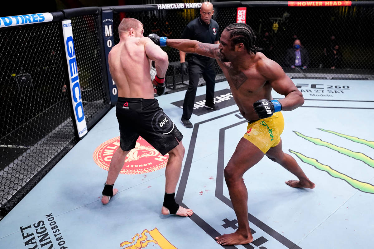 Ryan Spann punches Misha Cirkunov of Latvia in a light heavyweight fight during the UFC Fight N ...