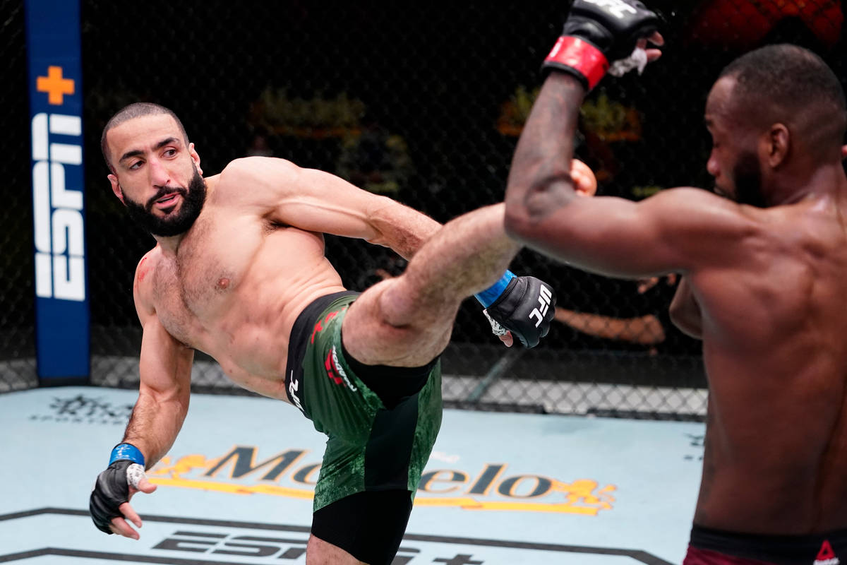 Bulal Muhammad kicks Leon Edwards of Jamaica in a welterweight fight during the UFC Fight Night ...