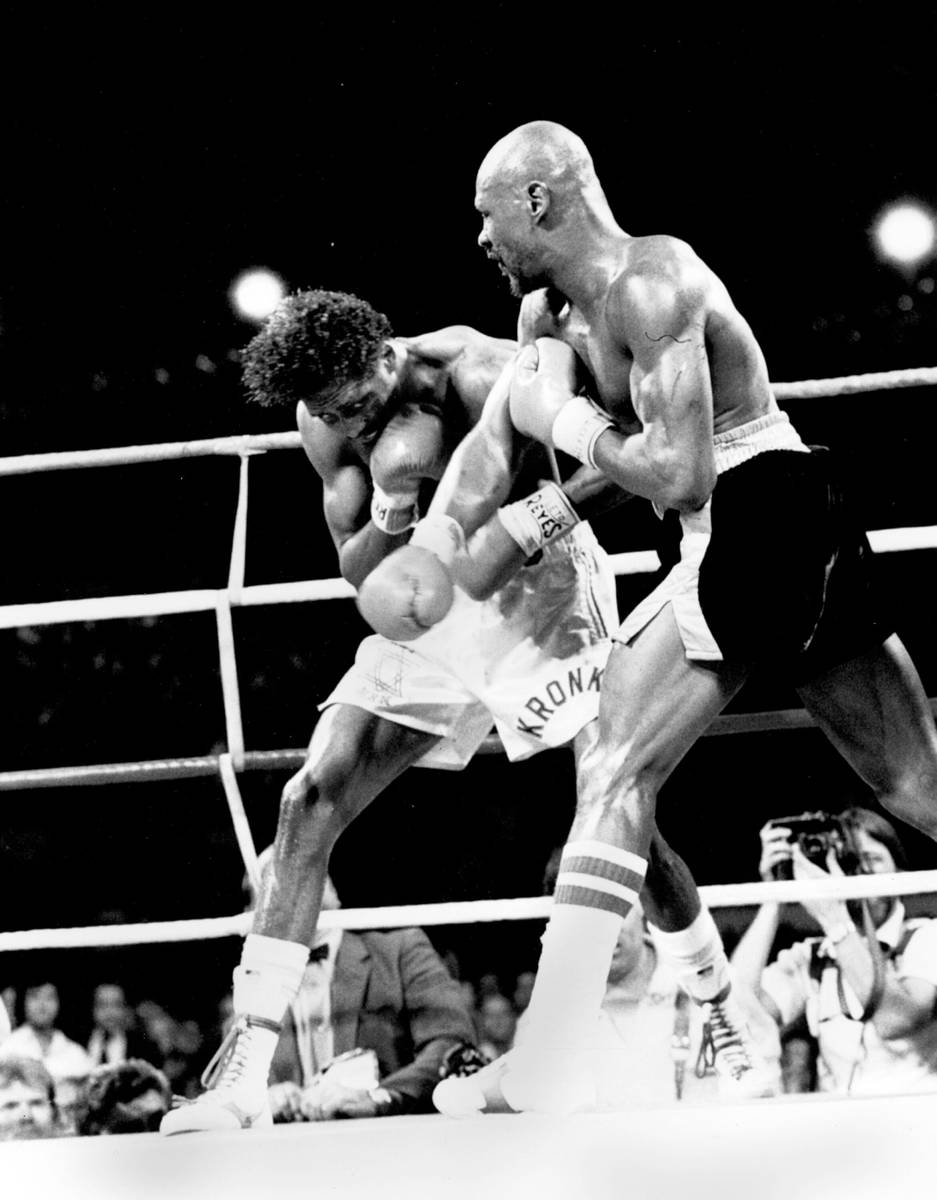 "Marvelous" Marvin Hagler, right, follows through on a right to Thomas "Hitman" Hearns in the s ...