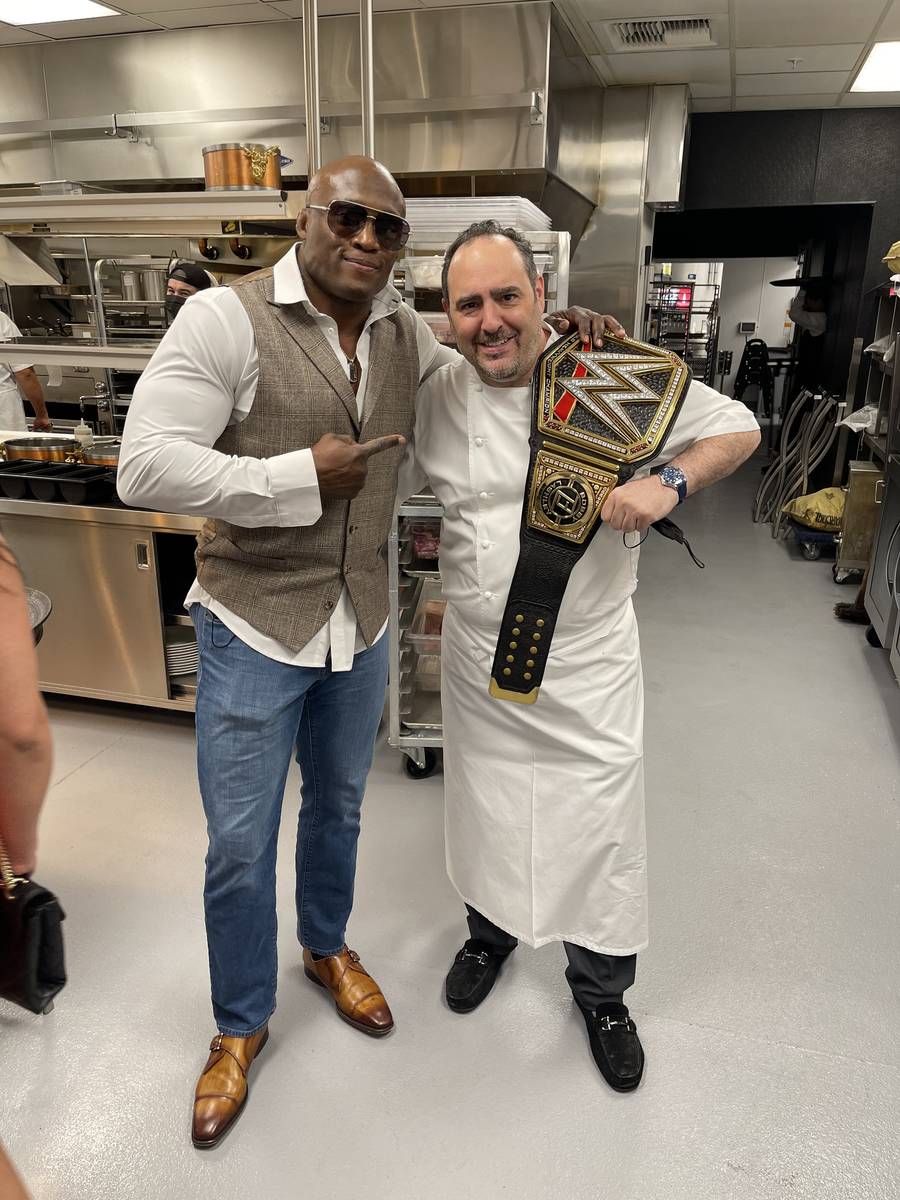 WWE champ Barry Ashley (left) is shown with Chef Barry Dakake at Barry's Downtown Prime on Frid ...