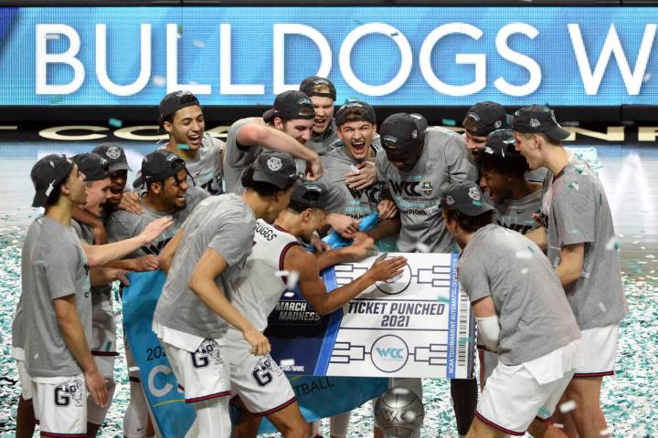 Gonzaga celebrates after they defeated BYU in an NCAA college basketball game for the West Coas ...