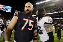 Philadelphia Eagles defensive end Chris Long (56) and his brother, Chicago Bears offensive guar ...