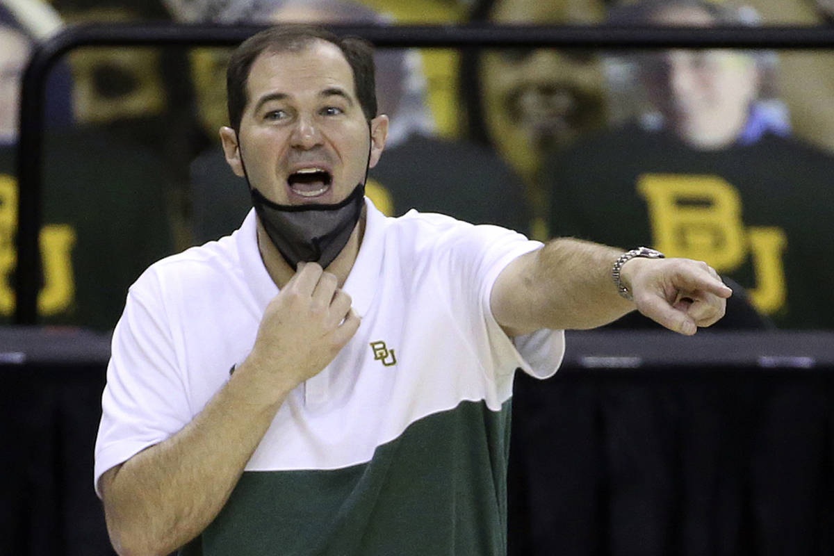 FILE - In this Dec. 30, 2020, file photo, Baylor head coach Scott Drew calls a play to his team ...