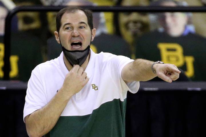 FILE - In this Dec. 30, 2020, file photo, Baylor head coach Scott Drew calls a play to his team ...