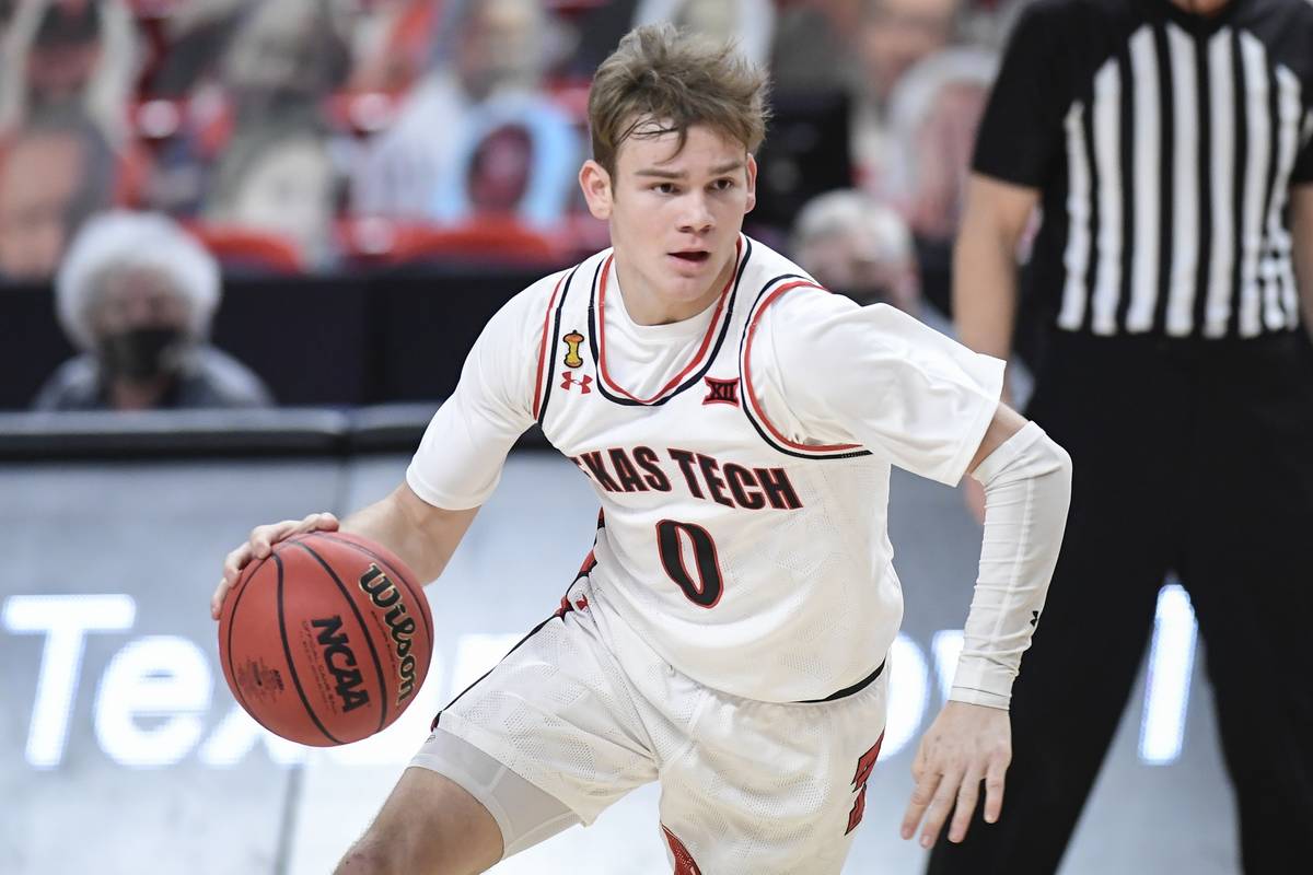 FILE - In this March 4, 2021, file photo, Texas Tech's Mac McClung (0) controls the ball during ...