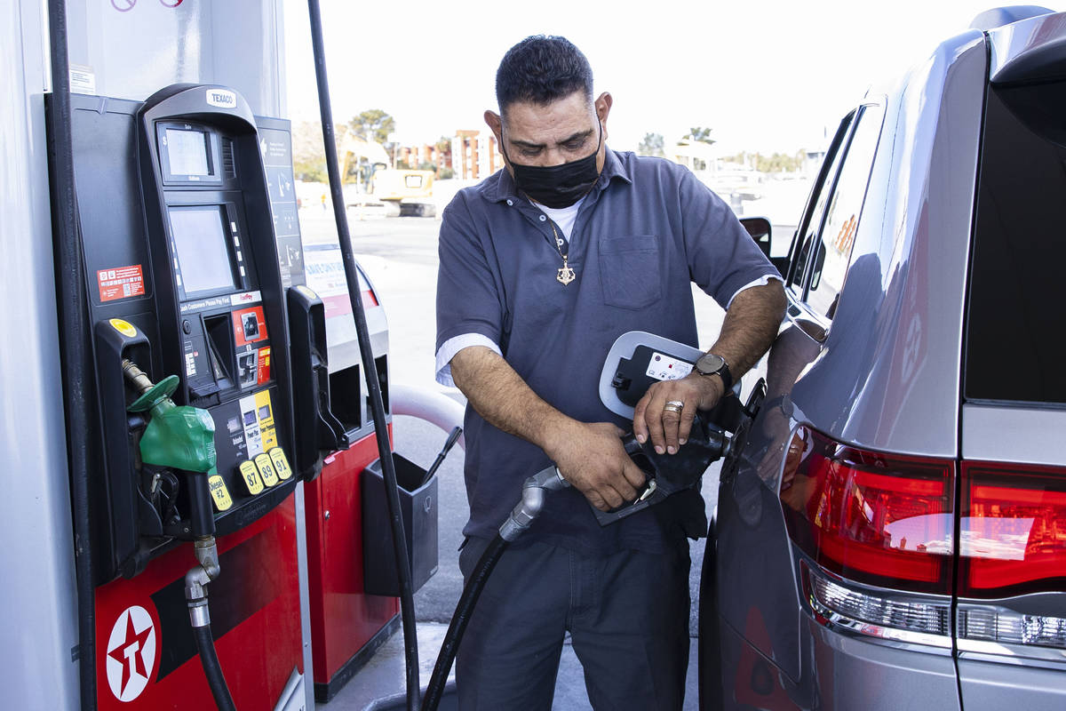Jack Alvarez pumps gas at Texaco gas station, on Decatur Avenue, on Monday, March, 15, 2021, in ...