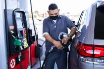 Jack Alvarez pumps gas at Texaco gas station, on Decatur Avenue, on Monday, March, 15, 2021, in ...