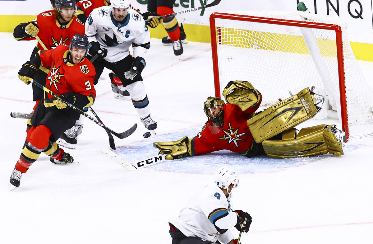 Golden Knights goaltender Marc-Andre Fleury (29) blocks a shot from San Jose Sharks' Evander Ka ...