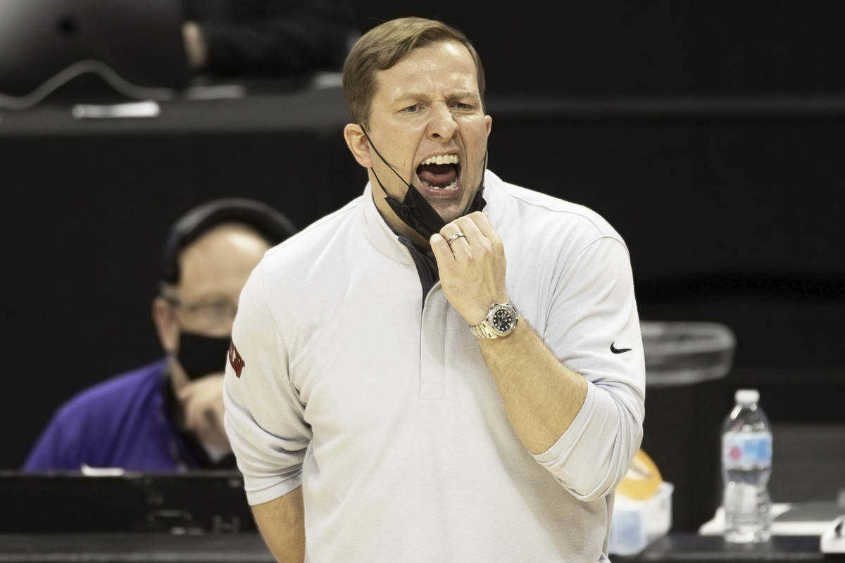 UNLV Rebels head coach T.J. Otzelberger tries to motivate his team in the second half during th ...